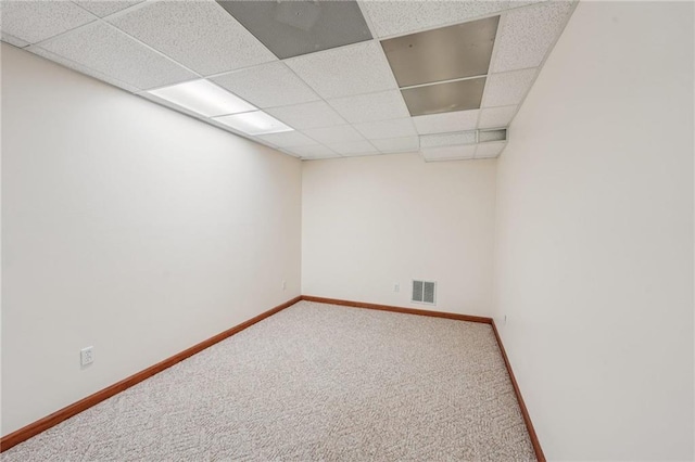 2110 Waterloo Cir, Lawrenceville, GA 30043 - carpeted empty room with a paneled ceiling and baseboards