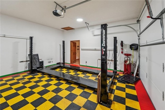 2110 Waterloo Cir, Lawrenceville, GA 30043 - exercise room featuring a garage and recessed lighting