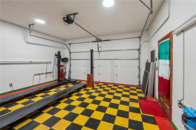 2110 Waterloo Cir, Lawrenceville, GA 30043 - garage featuring a garage door opener
