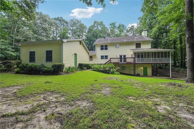 2110 Waterloo Cir, Lawrenceville, GA 30043 - back of property featuring a sunroom, a chimney, a yard, a deck, and stairway