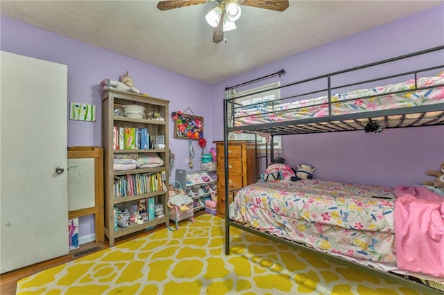 bedroom featuring ceiling fan