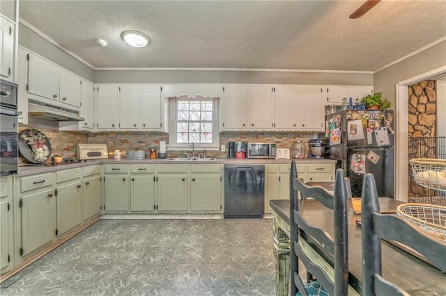 kitchen featuring sink, tasteful backsplash, ornamental molding, green cabinets, and black appliances