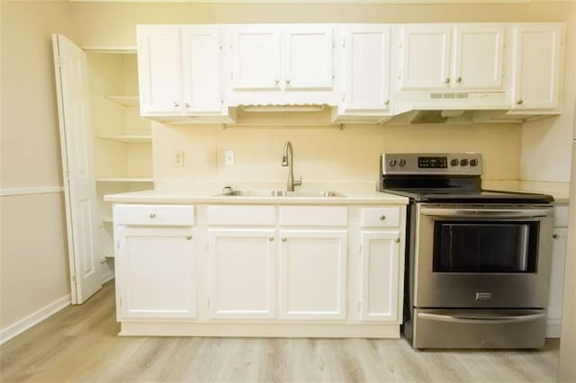 kitchen with a sink, under cabinet range hood, electric stove, white cabinetry, and open shelves