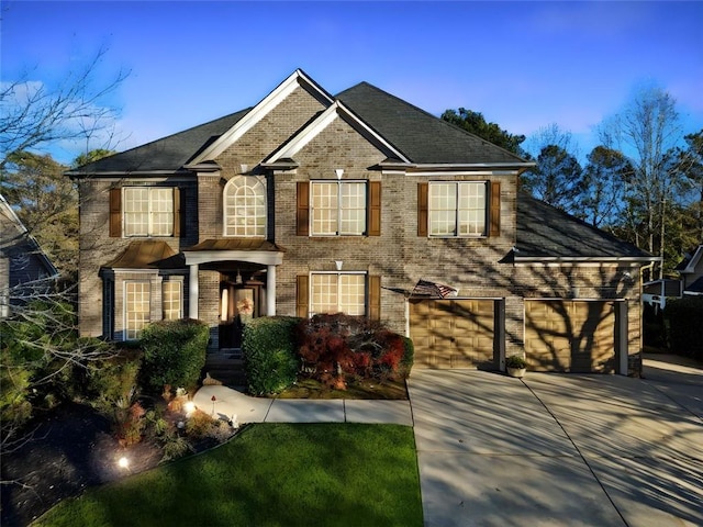 view of front of property with a garage