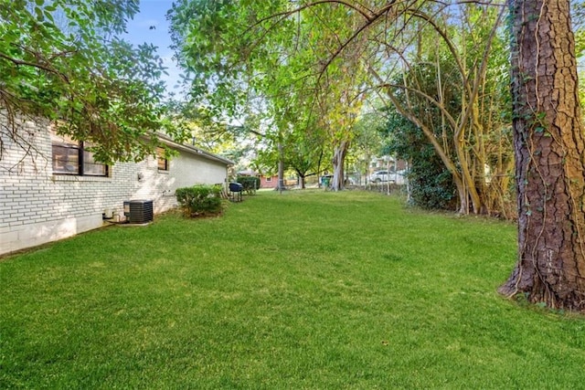 view of yard with central AC