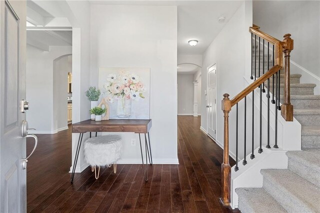 306 Springwater Way, Bremen, GA 30110 - entrance foyer with arched walkways, hardwood / wood-style floors, and stairway