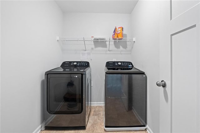 306 Springwater Way, Bremen, GA 30110 - laundry area featuring washing machine and dryer and baseboards