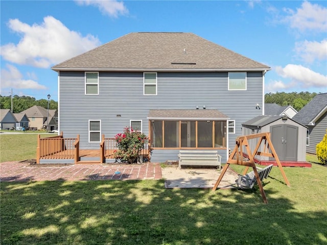 306 Springwater Way, Bremen, GA 30110 - back of house with a sunroom, a shed, a patio, a wooden deck, and a yard