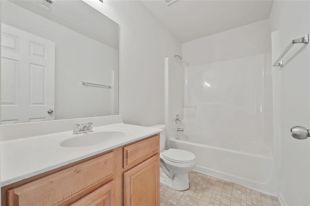 full bath featuring toilet, vanity, and washtub / shower combination