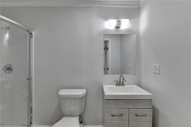 bathroom with vanity, toilet, and an enclosed shower