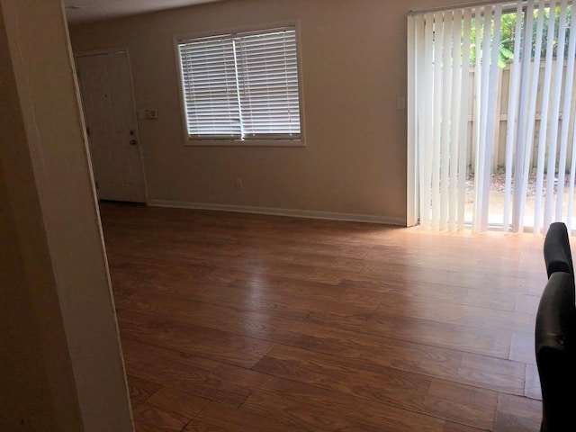 1151 Rankin St Unit 21A, Stone Mountain, GA 30083 - spare room featuring wood finished floors and baseboards