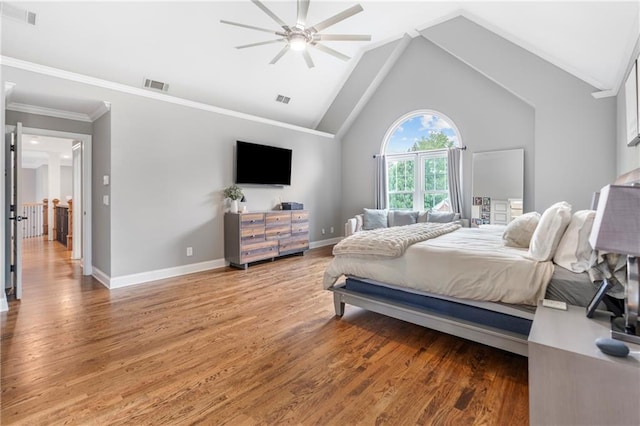 2510 Wood Creek Ct, Dacula, GA 30019 - bedroom with light wood-style floors, baseboards, lofted ceiling, ornamental molding, and a ceiling fan