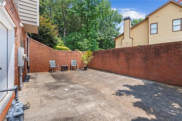 2510 Wood Creek Ct, Dacula, GA 30019 - fenced backyard featuring a patio area