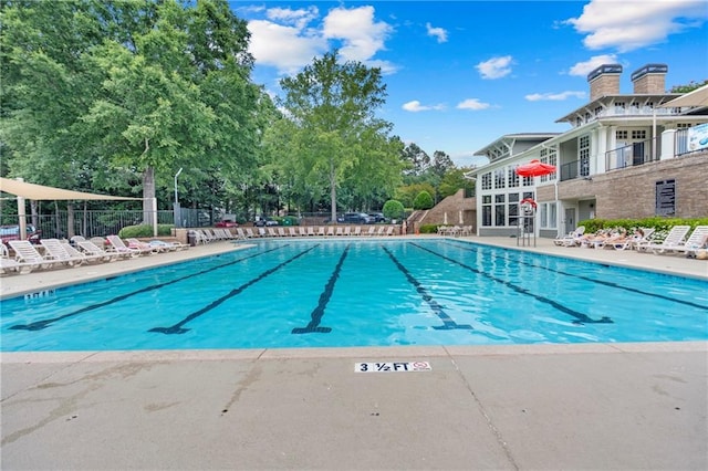 2510 Wood Creek Ct, Dacula, GA 30019 - community pool featuring view of scattered trees and a patio