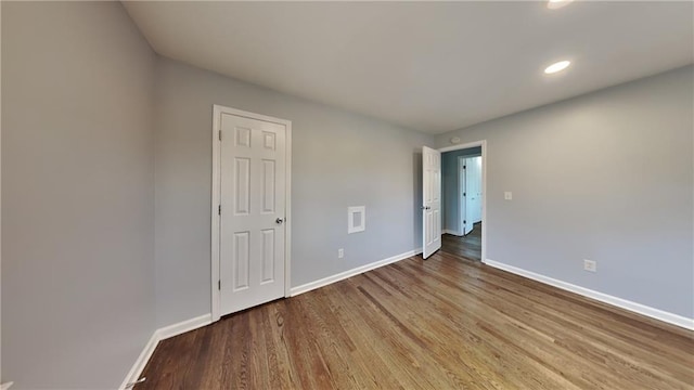 spare room featuring light hardwood / wood-style flooring