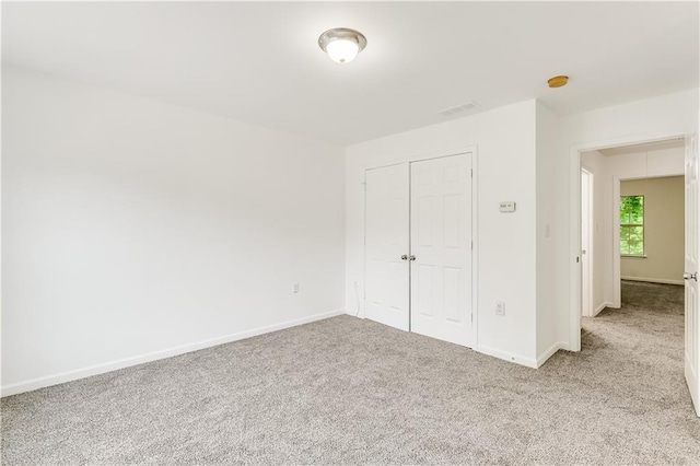 2520 Laurel Cir NW, Atlanta, GA 30311 - unfurnished bedroom with carpet, baseboards, and a closet