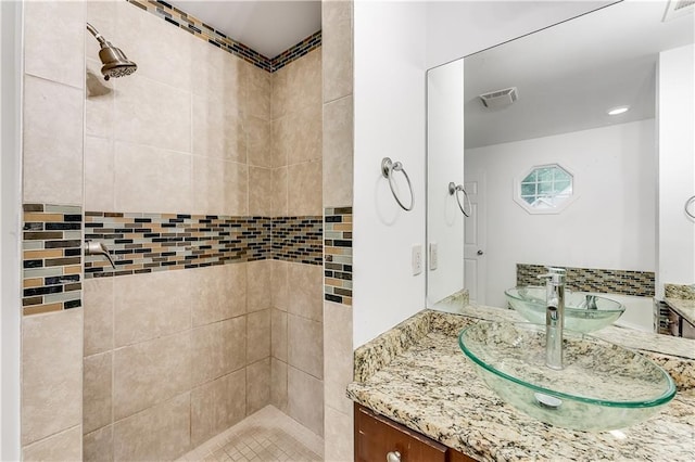 2520 Laurel Cir NW, Atlanta, GA 30311 - bathroom featuring a tile shower and vanity