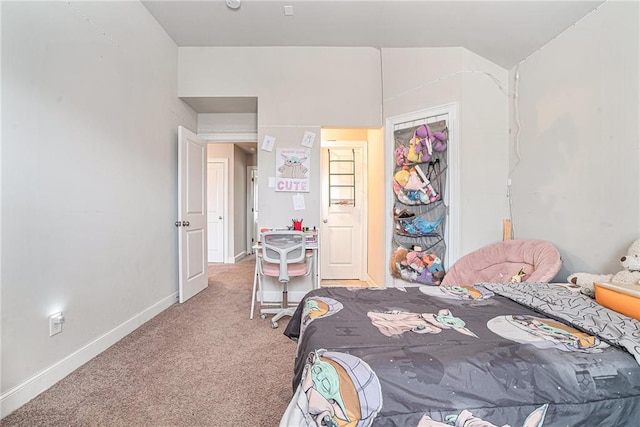 bedroom with carpet and a closet