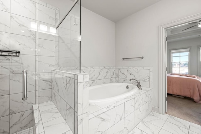 bathroom with a stall shower, connected bathroom, marble finish floor, and a bath