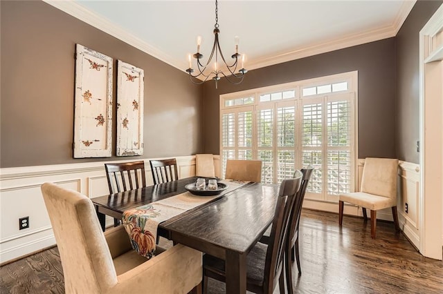162 Taylor Ridge Way, Milton, GA 30004 - dining area featuring a chandelier, crown molding, a wainscoted wall, and dark wood-type flooring