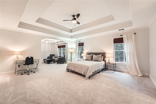 162 Taylor Ridge Way, Milton, GA 30004 - carpeted bedroom with a raised ceiling, crown molding, an office area, a ceiling fan, and arched walkways