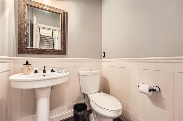 162 Taylor Ridge Way, Milton, GA 30004 - half bathroom with a decorative wall and a wainscoted wall