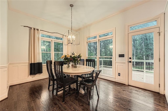 162 Taylor Ridge Way, Milton, GA 30004 - dining space with a chandelier, ornamental molding, plenty of natural light, a wainscoted wall, and dark wood-style flooring