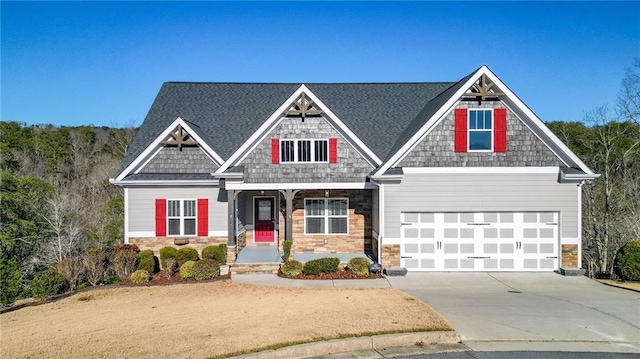 craftsman inspired home with a garage