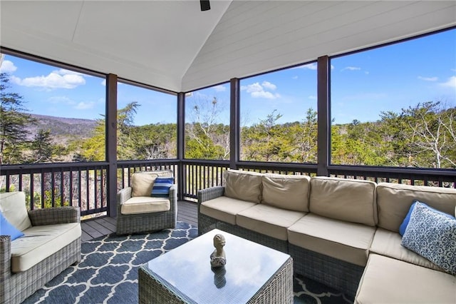 sunroom with vaulted ceiling