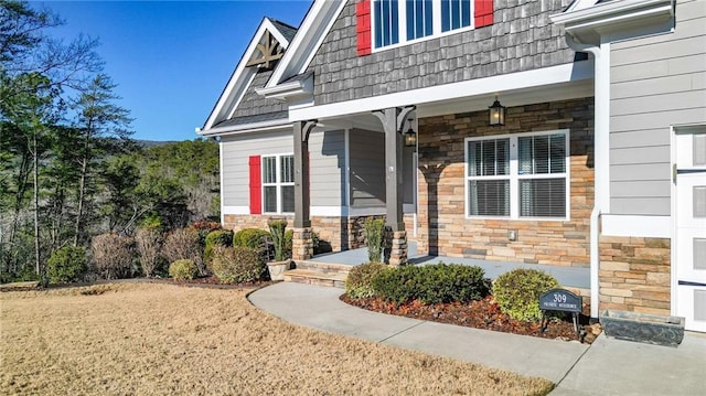 property entrance featuring a porch