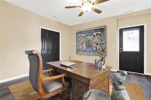 office area with dark hardwood / wood-style flooring and ceiling fan