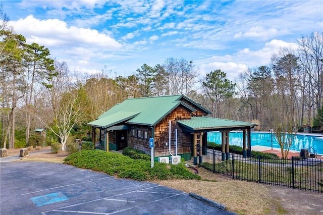 view of property's community with a pool