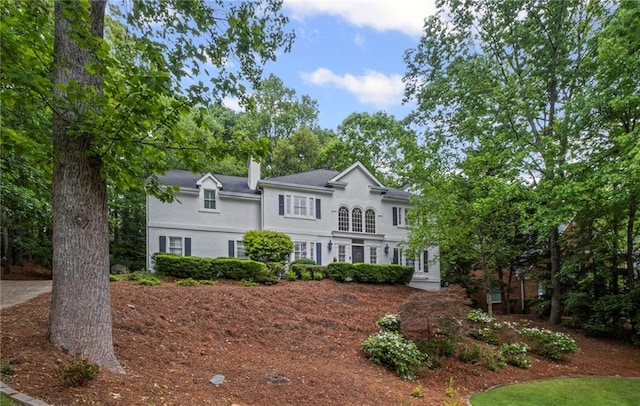 7750 Landowne Dr, Atlanta, GA 30350 - view of front of property featuring a chimney and stucco siding