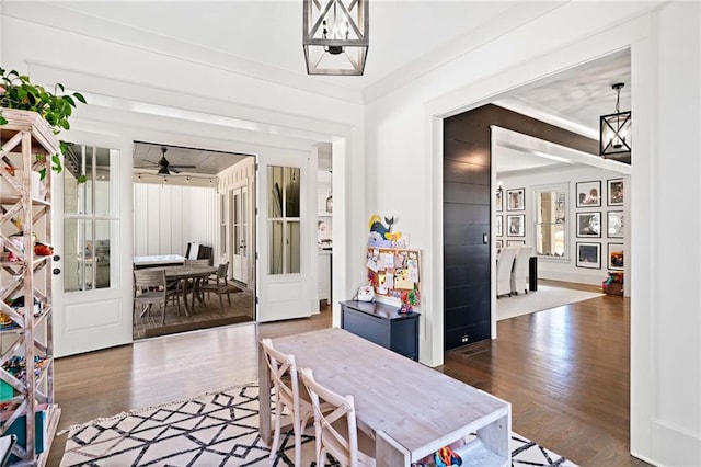 124 Long Shadows Dr, Alpharetta, GA 30004 - dining area with wood finished floors, ceiling fan, a chandelier, and crown molding