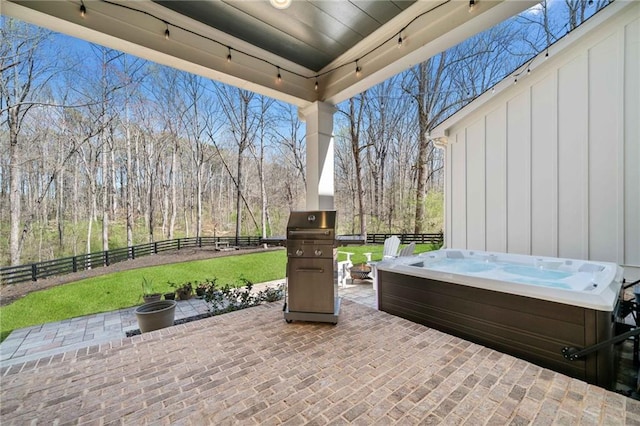 124 Long Shadows Dr, Alpharetta, GA 30004 - fenced backyard featuring a hot tub, a patio, and a grill