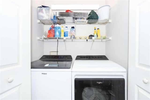 laundry room featuring washer and clothes dryer