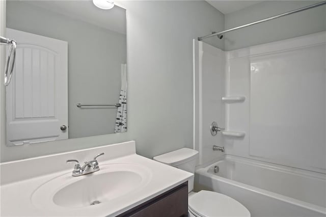 full bath featuring shower / bath combination, toilet, and vanity
