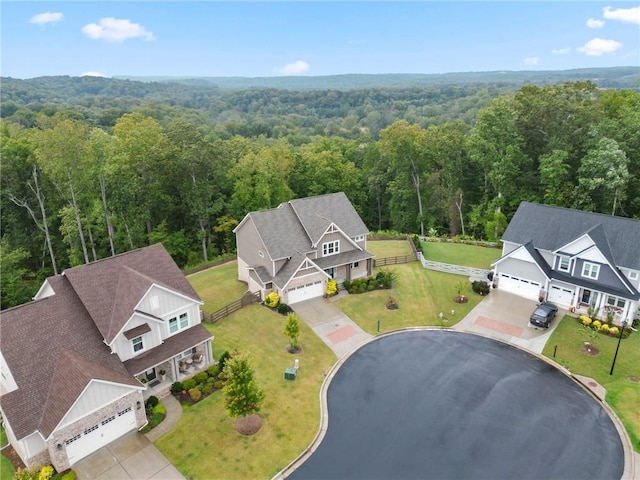 bird's eye view featuring a forest view