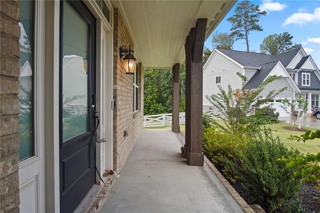 view of patio featuring a porch