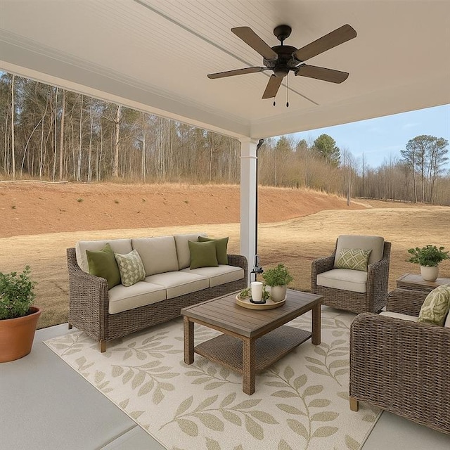 view of patio with an outdoor living space and a ceiling fan