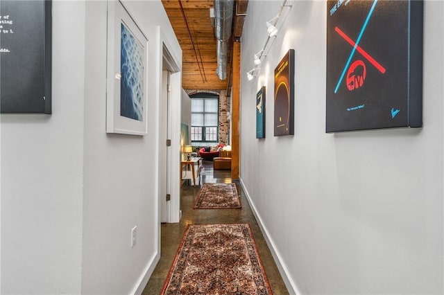 hallway featuring wood ceiling