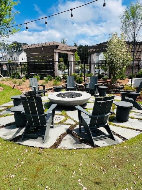 6930 Pond View Dr, Cumming, GA 30028 - view of community with an outdoor fire pit
