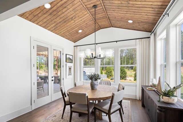 6930 Pond View Dr, Cumming, GA 30028 - dining area featuring vaulted ceiling, wood ceiling, a chandelier, hardwood / wood-style floors, and french doors