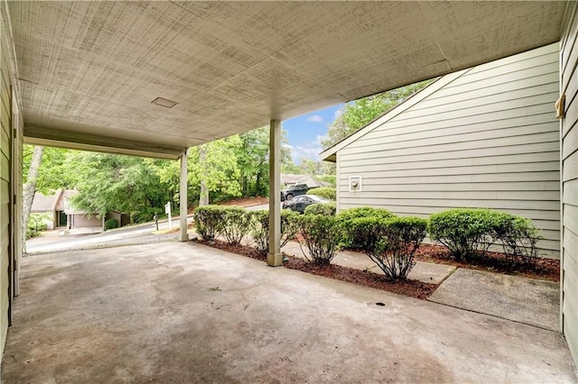view of patio / terrace featuring a carport