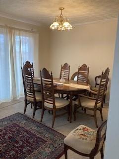 dining room with a chandelier