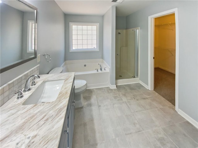 93 Wolfridge Ct, Dallas, GA 30132 - bathroom with vanity, a bath, baseboards, and a stall shower