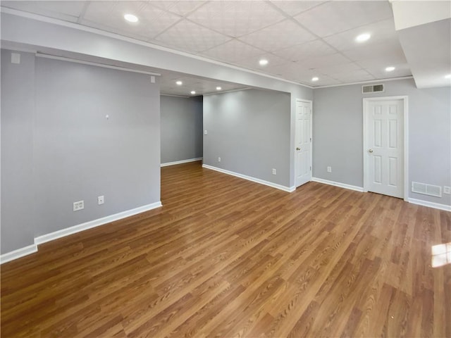 93 Wolfridge Ct, Dallas, GA 30132 - finished below grade area with wood finished floors, recessed lighting, baseboards, and visible vents