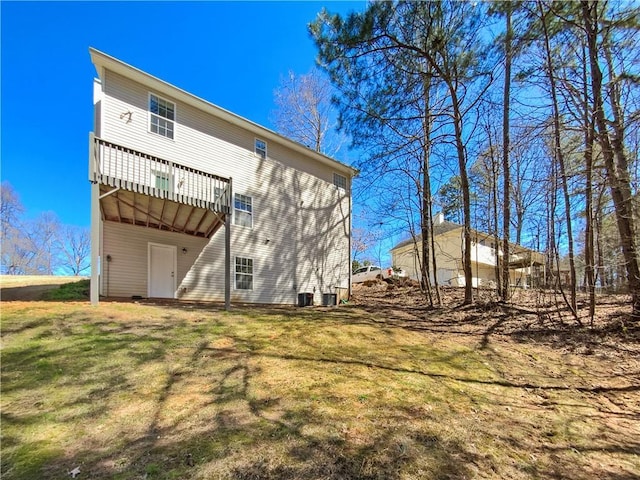 93 Wolfridge Ct, Dallas, GA 30132 - back of house featuring a yard, central AC, and a wooden deck