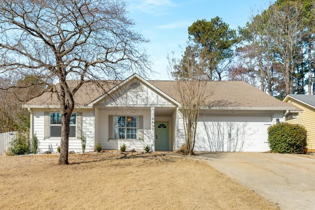 ranch-style house with a garage, concrete driveway, and a shingled roof