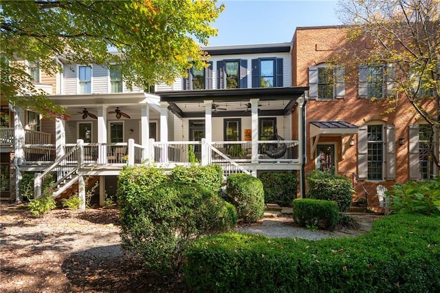 rear view of property with ceiling fan and a porch